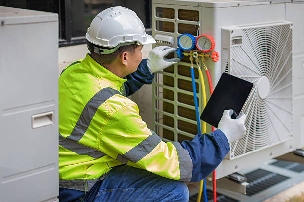 Professional Hvac technician working in Fredericktown, OH